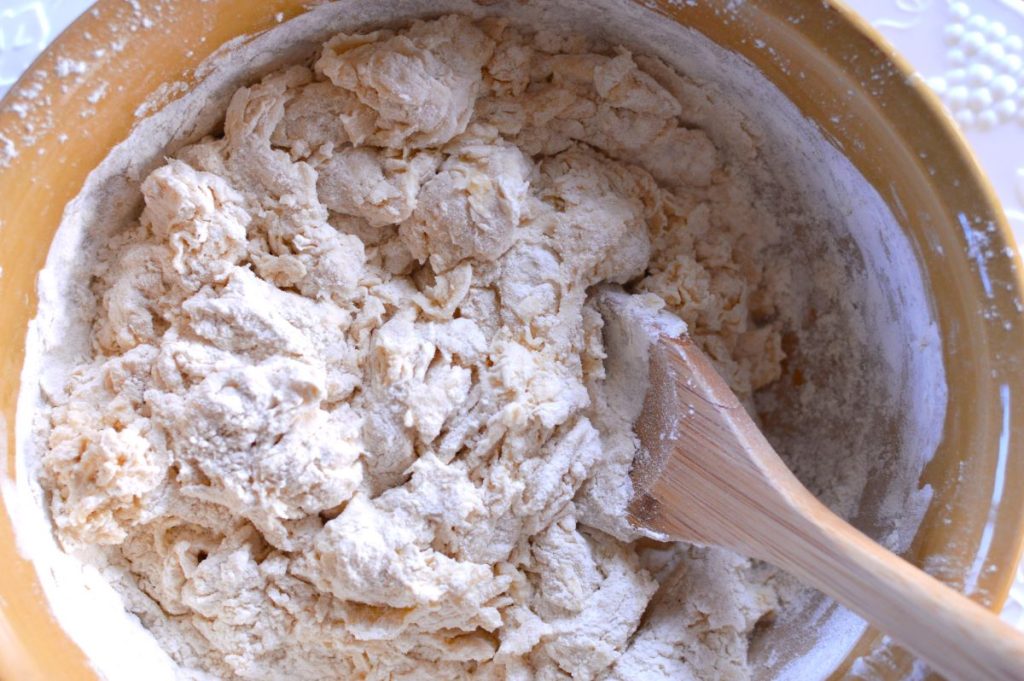 bowl of roughly mixed English muffin dough