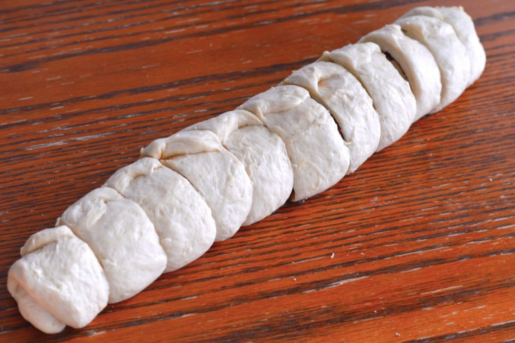 long roll dough cut into 11 slices