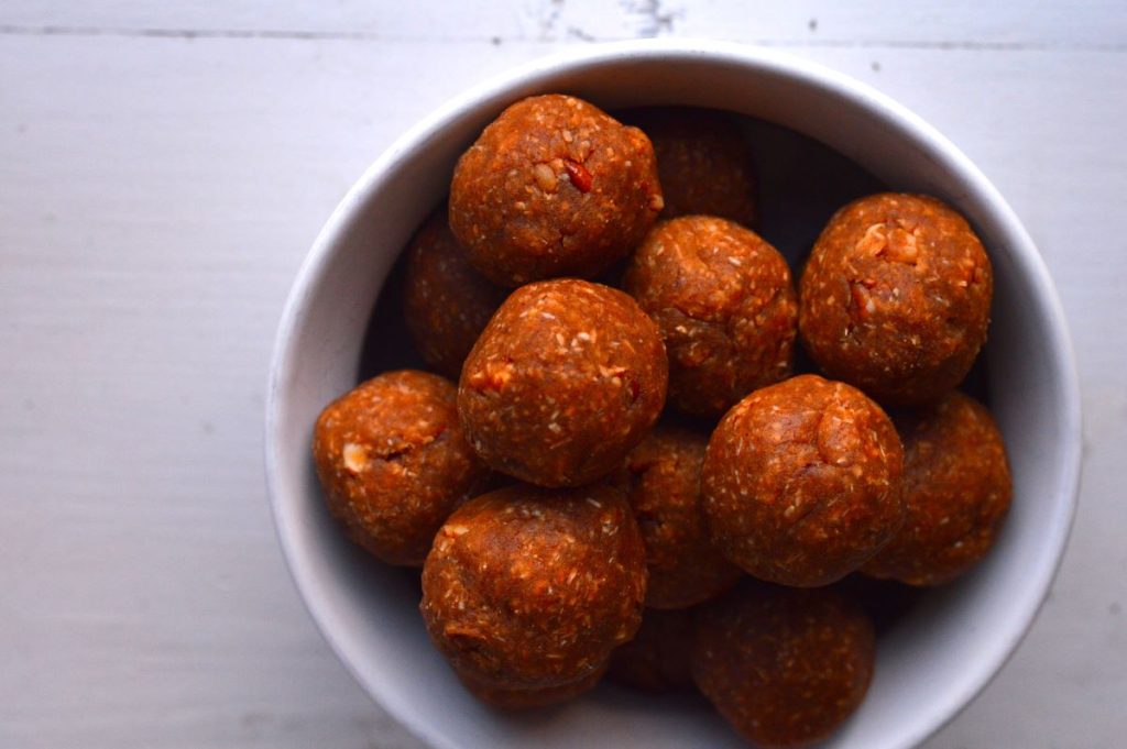 small bowl of peanut butter balls in a pile