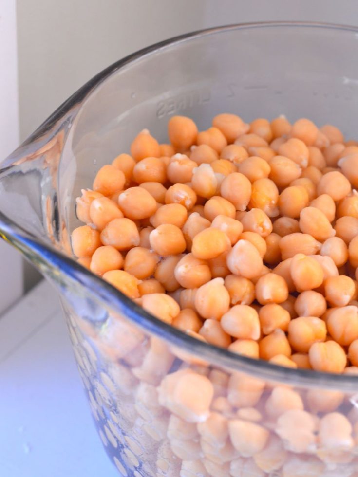 cooked chickpeas in glass bowl