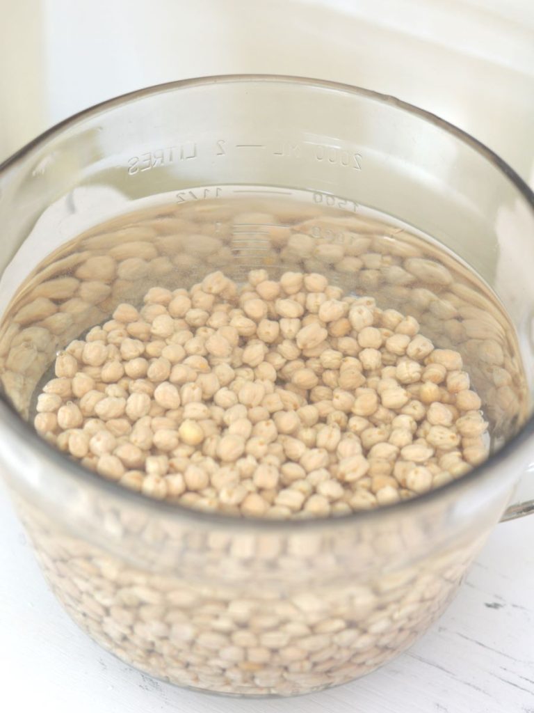 top view of chickpeas soaking in water